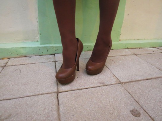Brown pumps and tights